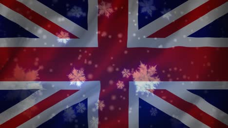 bandera del reino unido y copos de nieve