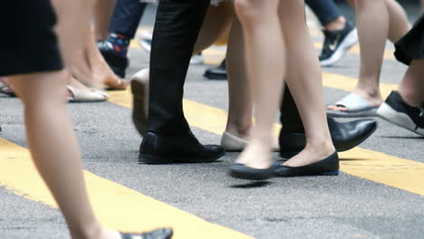 close up of people walking on crowded street in slow motion