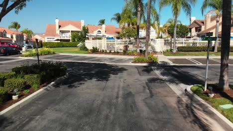 Aerial-fly-into-a-condo-complex-over-the-entry-road