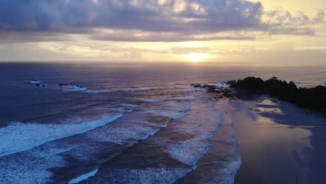 intense sunset over playa guiones, vast seascape