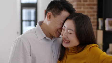happy couple reveals baby ultrasound