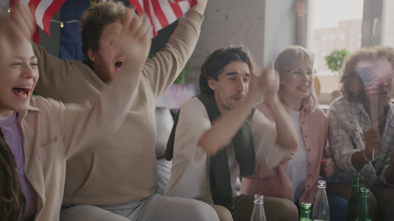 Friends cheering on a sporting event