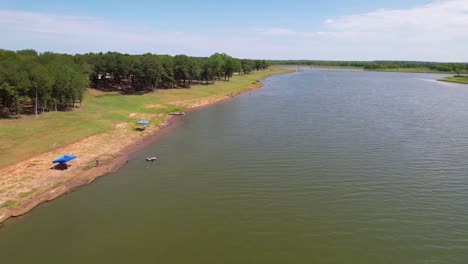 Aerial-video-flying-the-shoreline-of-Plowman-Creek-Park-on-Lake-Whitney-in-Texas