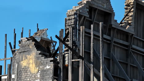 remains of a shelled brick house burned down