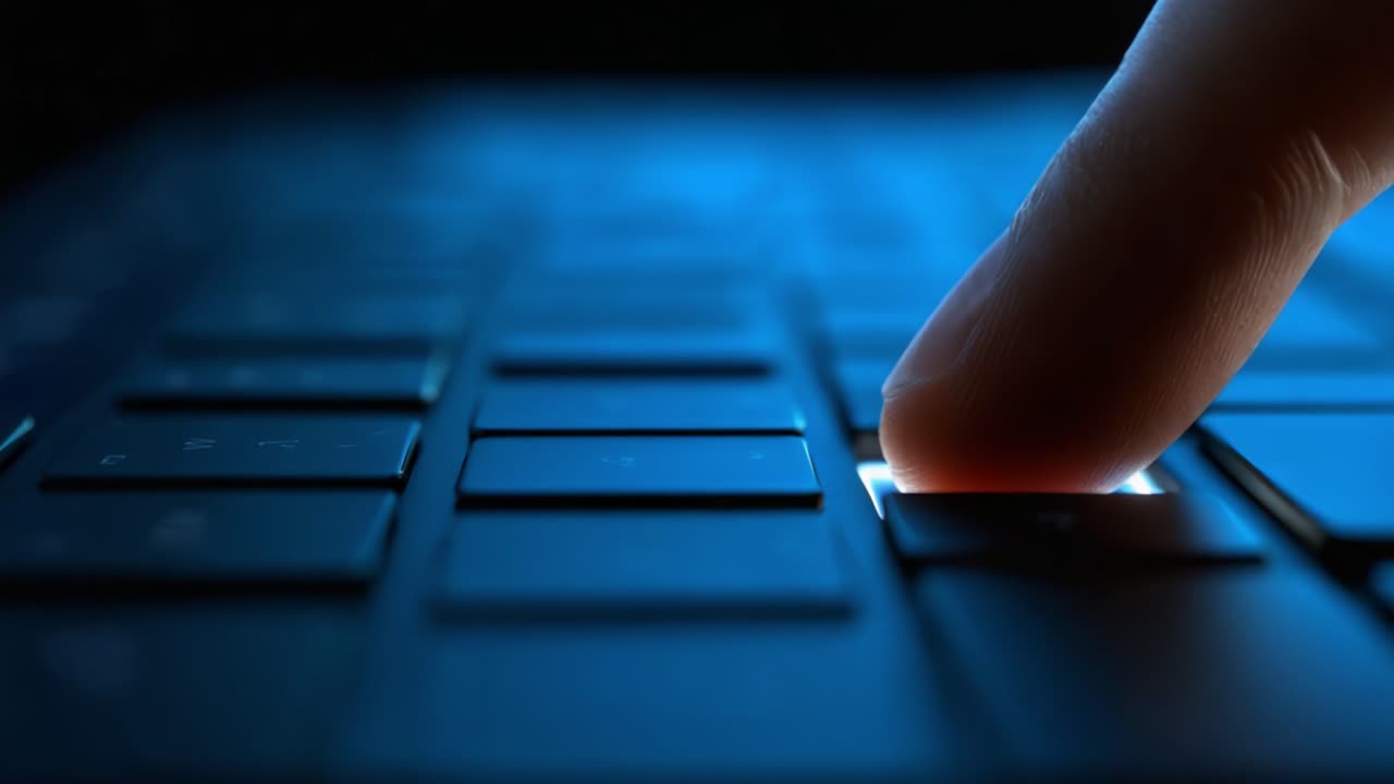 A Close-Up View of a Finger Hovering Over a Keyboard Key, Capturing the Moment Before Activation in a Softly Lit, High-Tech Environment