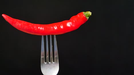 red chili pepper on a fork