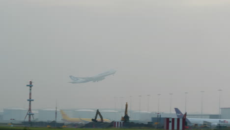 magnum cargo boeing 747 taking off in fog