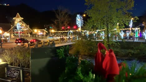 christmas city scene with a river in the foreground