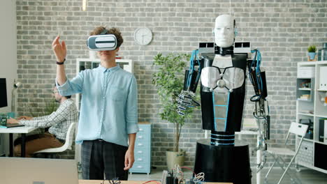 Person with VR headset interacting with a robot in an office setting