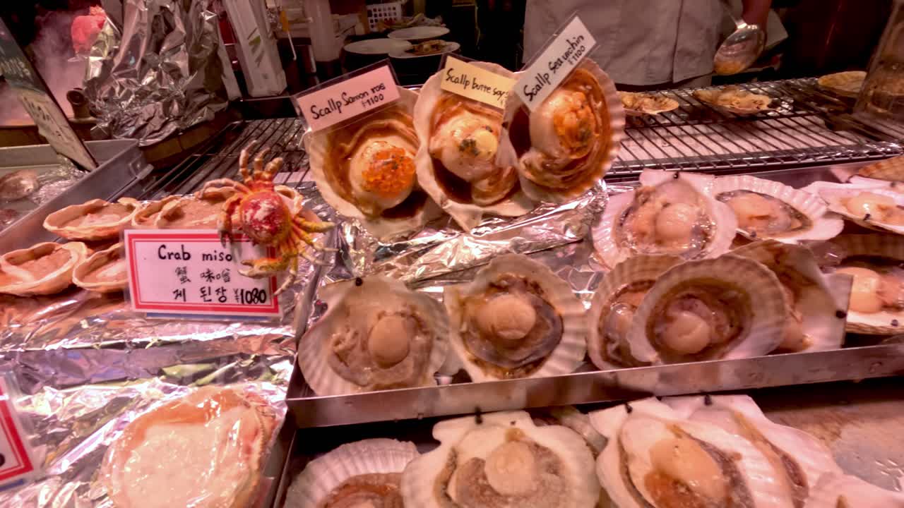 Display of scallops and crab gratin