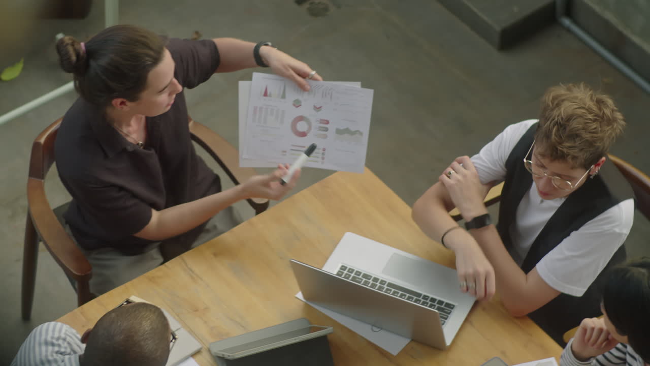 Business meeting with presentation of charts