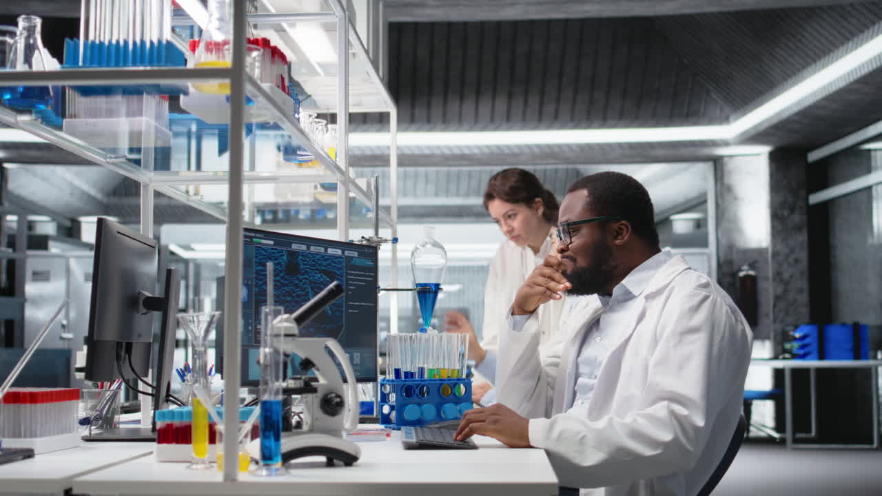 Vertical video Confused laboratory scientist frowning while looking at DNA patient data