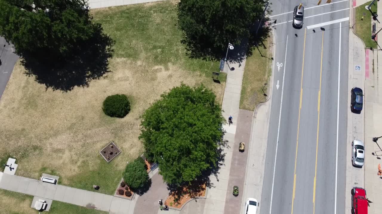 Aerial View of Urban Park and Street with Traffic