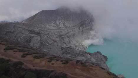 Mount-Ijen-Volcanic-Lake-in-East-Java,-Indonesia---Aerial