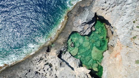 heart shaped green lake, natural sea pool in kithira, greece