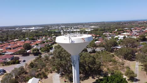 aerial orbit of water tower with joondalup city in background, perth australia