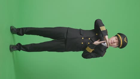 pilot in uniform on green screen