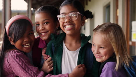 group of smiling schoolgirls