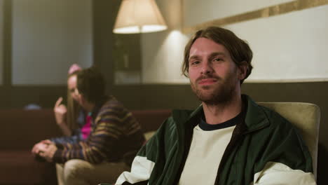 man listening to music at home