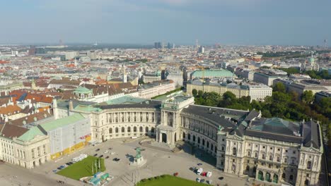 Drone-Flying-Away-from-Hofburg-Palace-in-Vienna,-Austria