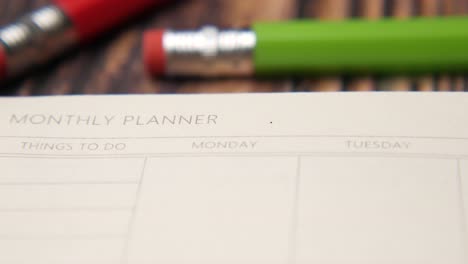 monthly planner with pencils