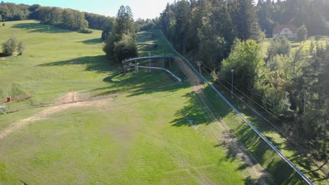 aerial over dry ski slope park in slovenia