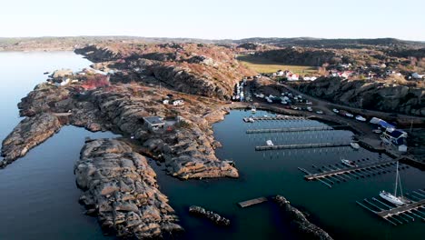 Boat-Harbor-on-Sweden's-Rugged-West-Coast,-Aerial-Establishing