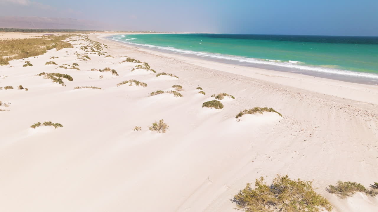 Flying Over The White Sand Beach In Socotra Island, Yemen In Summer. - aerial shot