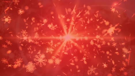 múltiples iconos de copos de nieve flotando contra el punto de luz sobre un fondo rojo