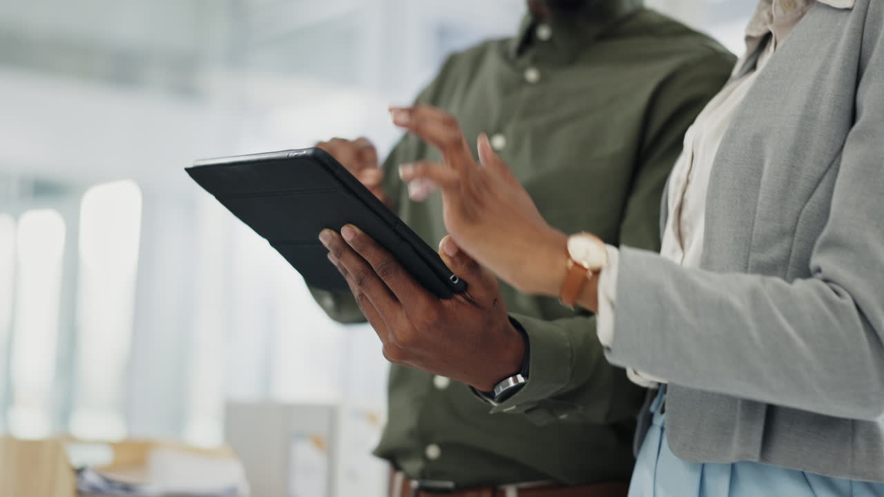 Tablet, hands and business people in office