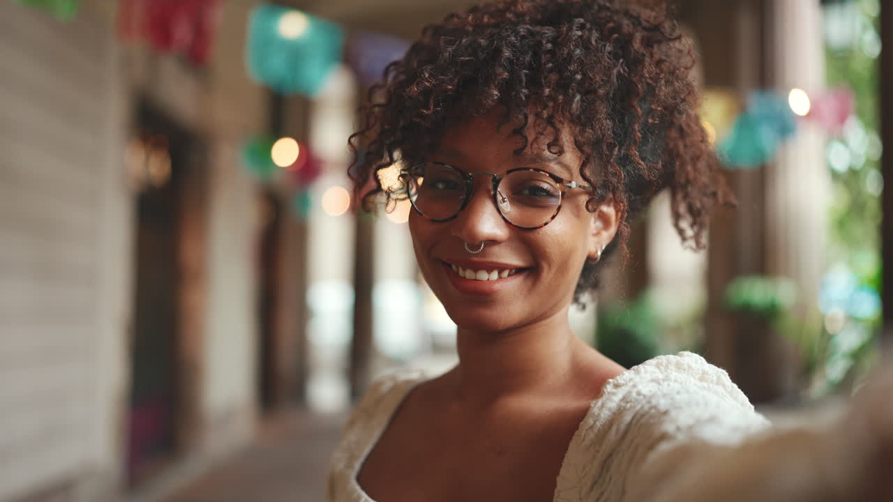 Smiling Woman with Curly Hair