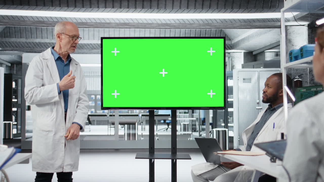 Chroma key display used by professor presenting innovative findings in lab