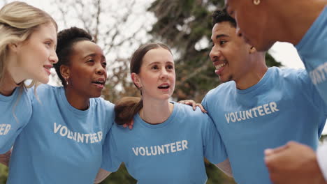 diverse group of young volunteers smiling and working together