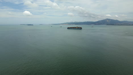 Cargo-Ship-Leaves-Xiamen-Port-China-And-Heads-Out-Onto-The-Open-Ocean-60FPS