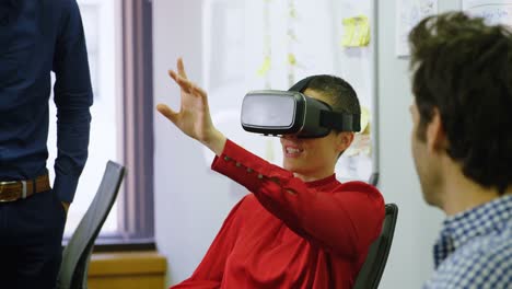 executive using virtual reality headset at desk 4k