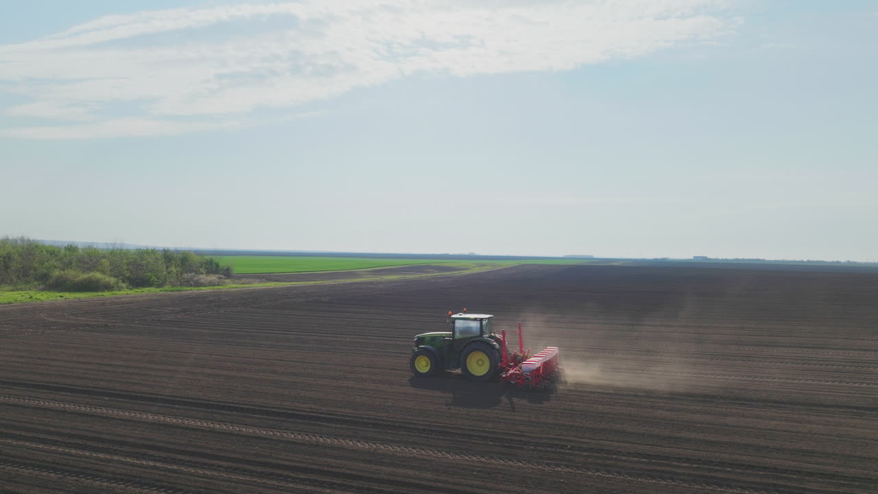 Tractor Planting Crops in a Field