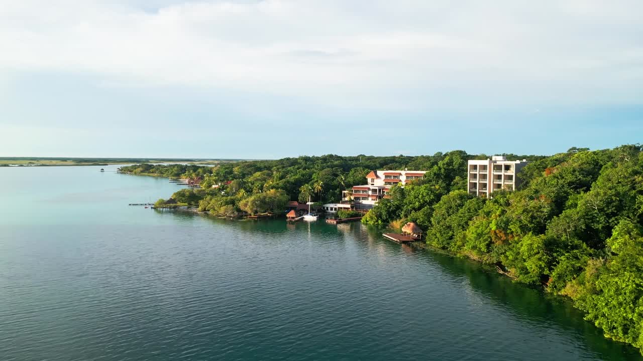 Scenic aerial view of Bacalar's lush greenery and tranquil blue waters