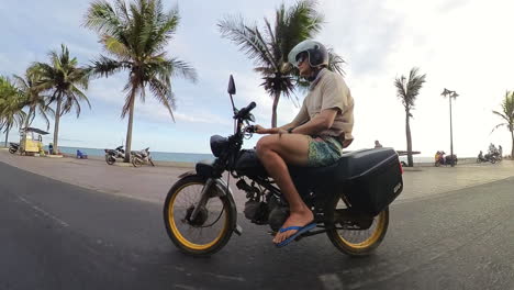 travling down the coastal road in mui ne, vietnam.