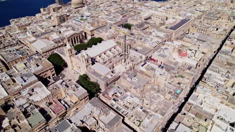 downtown city buildings in historic valetta, malta - aerial drone view