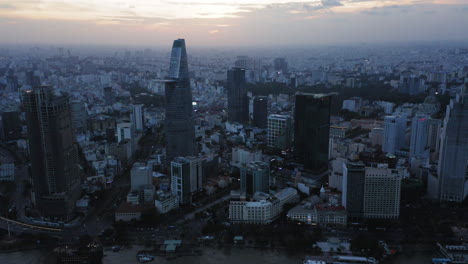 aerial view of ho chi minh, skyscrapers and river views at sunset