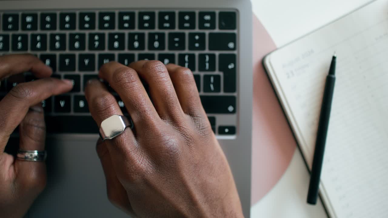 Person typing on a laptop