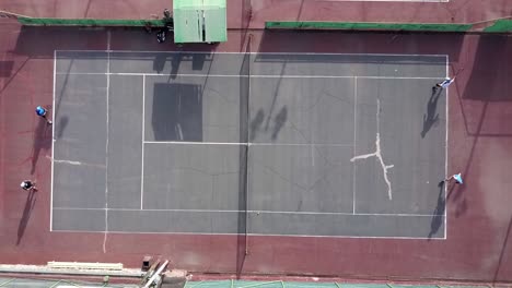 overhead view of tennis match in progress