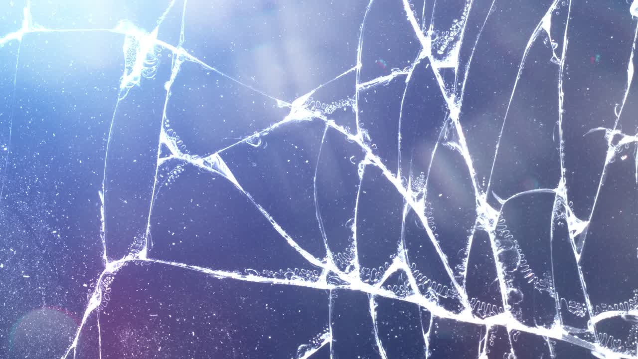 빛과 렌즈  ⁇ 으로 균열된 유리의 배경 애니메이션