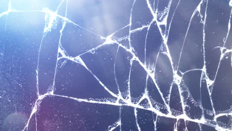 Background-animation-of-cracked-glass-with-lights-and-lens-dirt