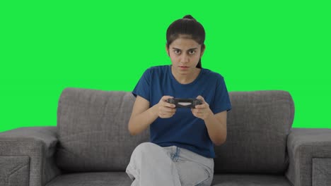 Indisches-Teenager-Mädchen-Spielt-Videospiele-Auf-Grünem-Bildschirm