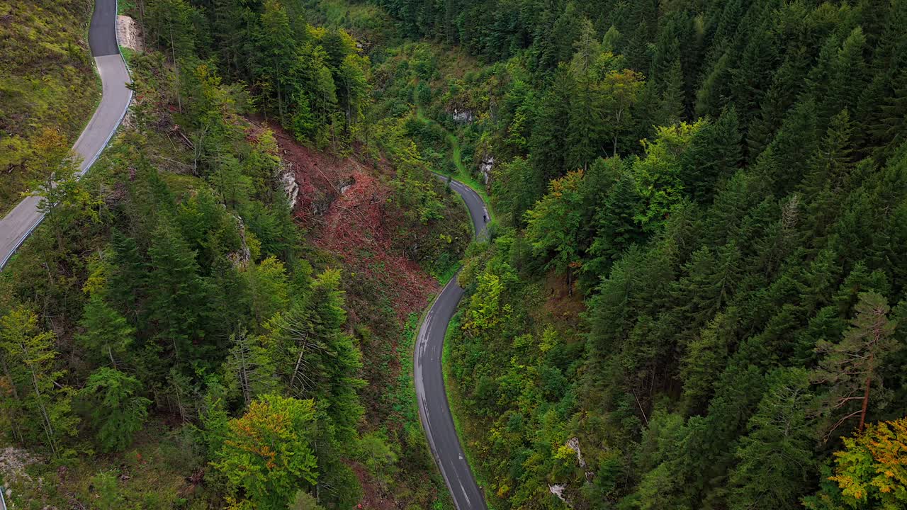 Aerial view of winding road in autumn forest in Semmering, Austria