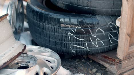 raining over tires and rims. static shot