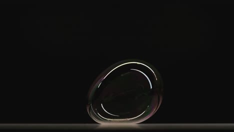 the one soap bubbles splits in two. slow motion