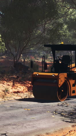 road roller working on a desert road