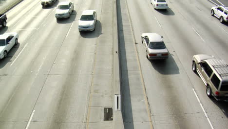 traffic moves slowly along a busy freeway in los angeles 20